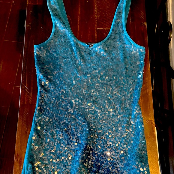Turquoise Sparkly Sleeveless Tops Small Turquoise Sequin Tank Top (Express) Color: Tan Size: S Vreta4346'S Closet Turquoise Sparkly Sleeveless Tops Small Turquoise Sequin Tank Top (Express) Color: Tan Size: S Vreta4346'S Closet